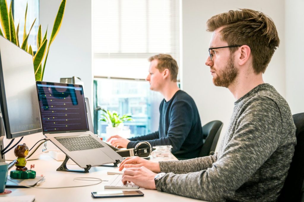 Staff using desktop apps on a unified communications platform